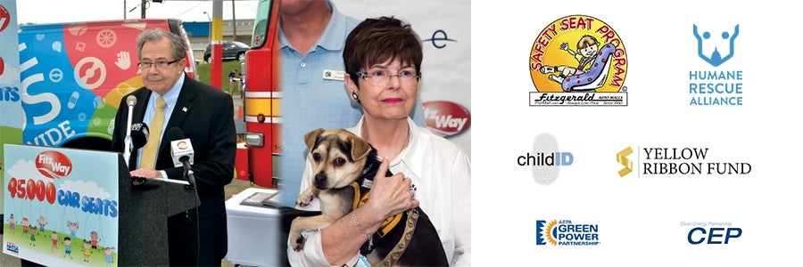 Gentleman is giving speech and elder women carrying dog in her hand and some symbols.